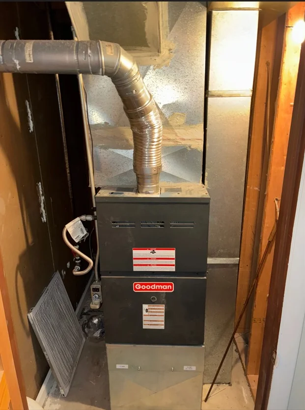 Goodman furnace with metal flex ductwork and return air filter installation in basement